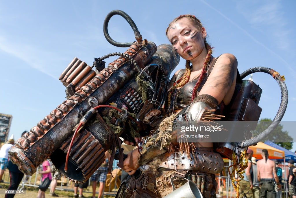 02 August 2018, Germany, Wacken: A festival visitor wears an end-time outfit at the Wacken Open Air. According to the organisers, the world's largest heavy metal festival starts with 75,000 visitors. Photo: Axel Heimken/dpa (Photo by Axel Heimken/picture alliance via Getty Images)