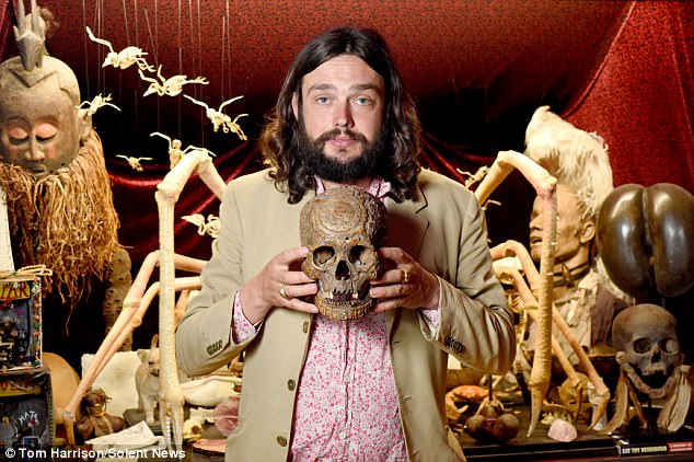 Mr Wynd holding a 18th Century Tibetan skull carved with a wheel calendar. This guys seems totally normal...