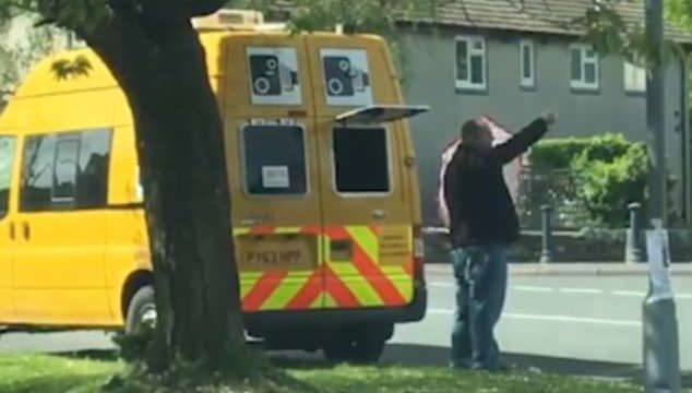 Legendary Dad hailed a hero for blocking speed camera with umbrella