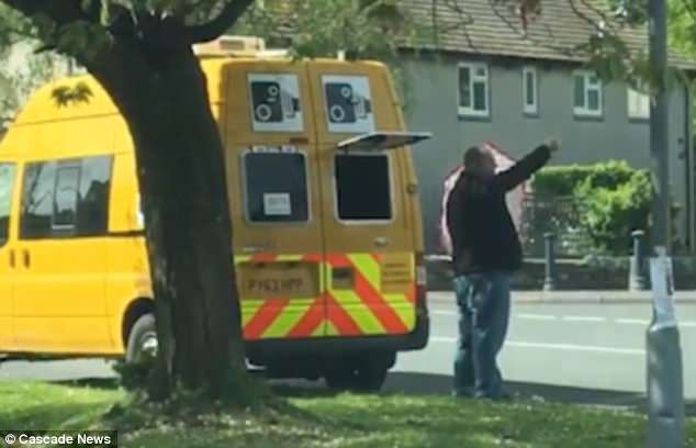 Legendary Dad hailed a hero for blocking speed camera with umbrella