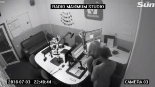 Randy news announcer busted on CCTV showing his missus some “breaking news”