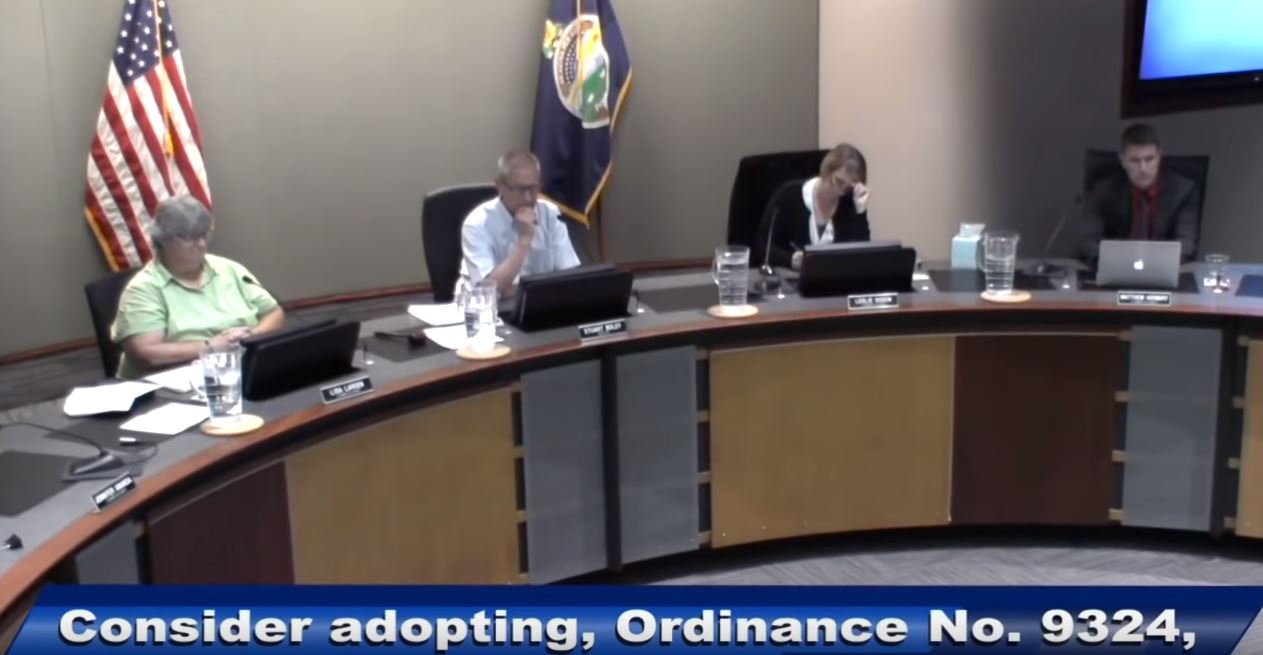 You just know the chick in black is trying not to laugh. Credit: KS City Commission 