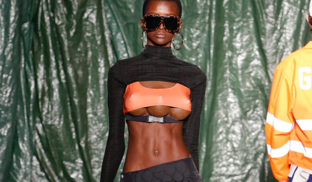 Triple breasted models walks the runway at Milan fashion week
