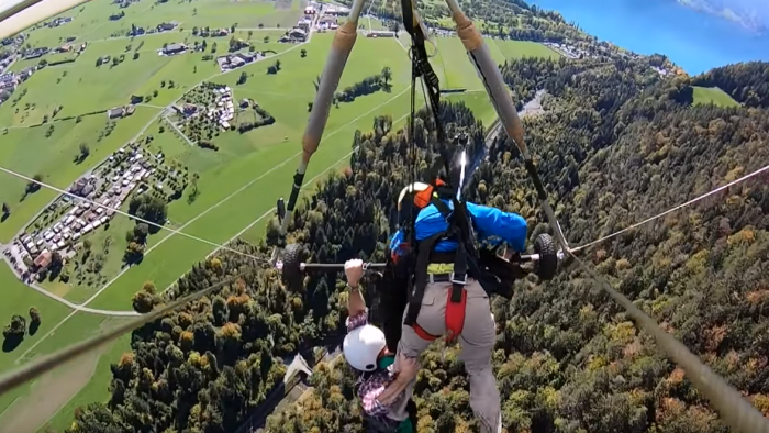 Hang glider cheats death after realising harness was not attached