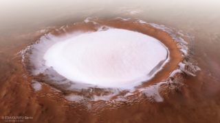 Unreal photos show huge crater full of ice discovered on Mars