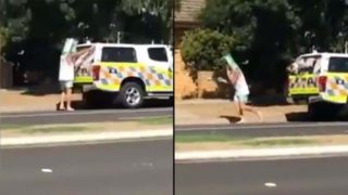 Bloke wearing empty beer carton on his head covers speed cameras with a tea towel