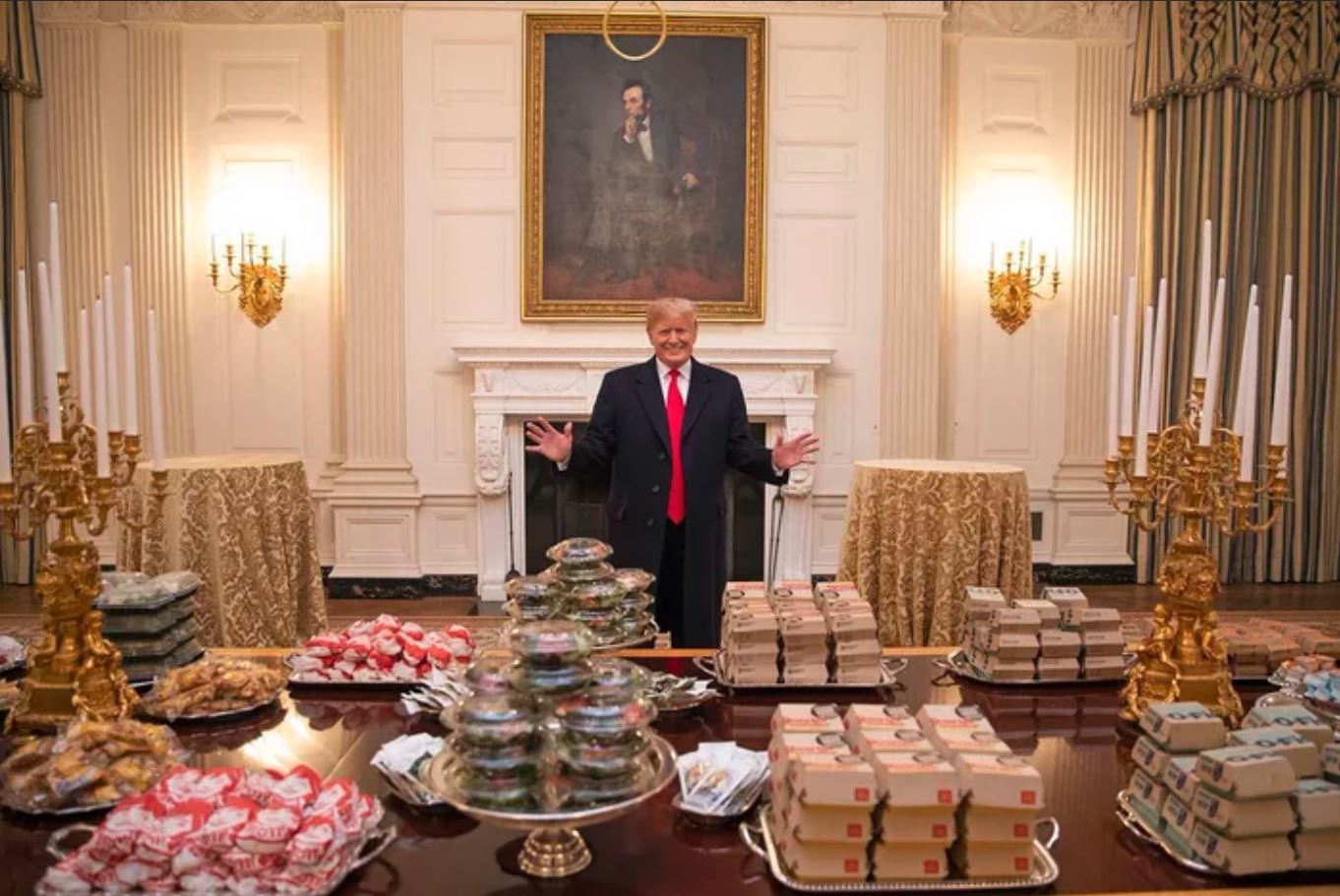 Trump serves McDonald’s on silver platters at White House lunch for college football champs
