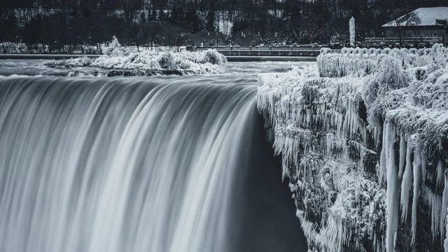 While Aussies swelter, North America is so f**ken cold that Niagara Falls has frozen over