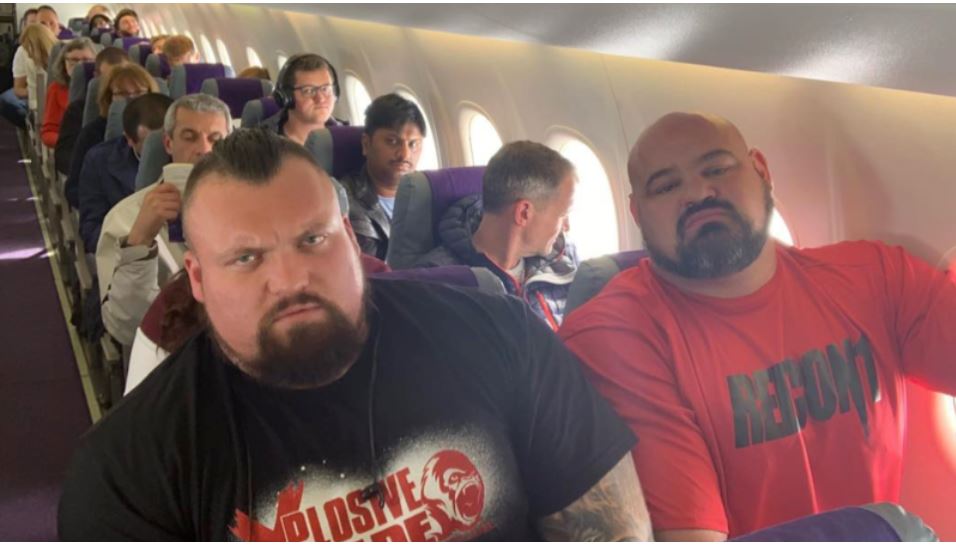 Two of the world’s strongest men were sat next to each other in economy class