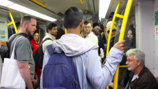U.S anti-abortion preacher gets shut down by Aussie bloke on busy train carriage