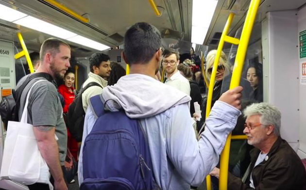 U.S anti-abortion preacher gets shut down by Aussie bloke on busy train carriage