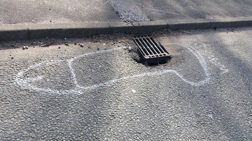 Bloke draws dicks around potholes so that his local Council would fix them