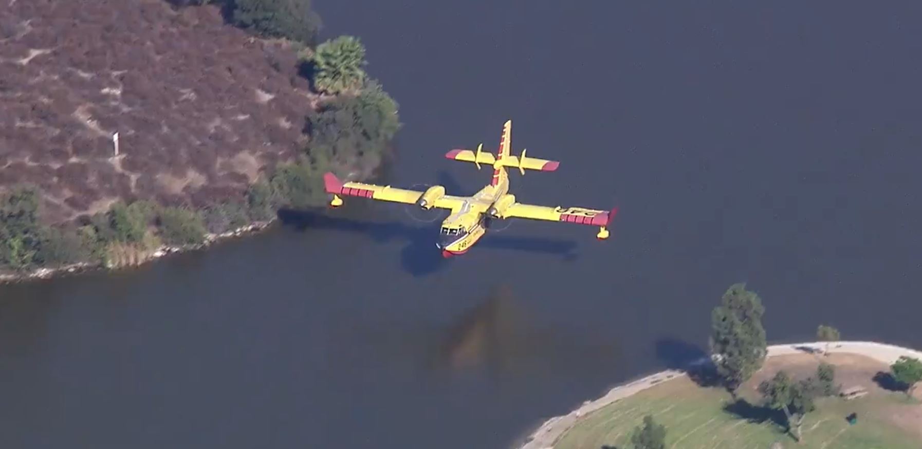 The epic piloting of this water-bomber plane has drawn world wide attention