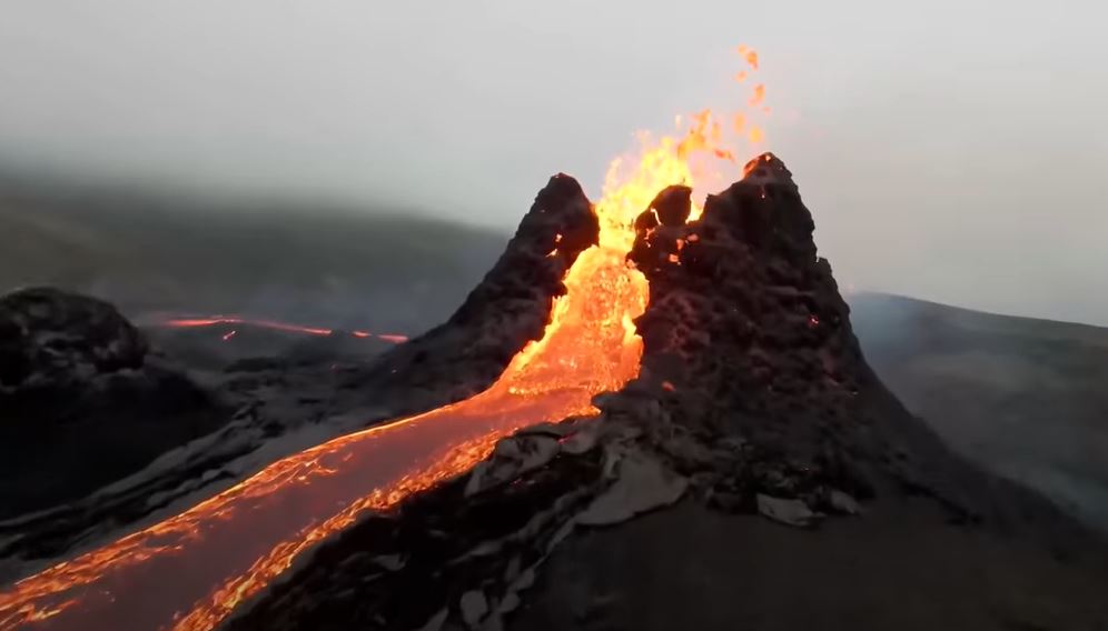 Incredible drone footage captures close-up views of volcano erupting in ...