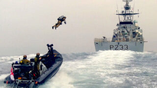 Awesome footage shows UK Marine f@*#en jetpack onto ship