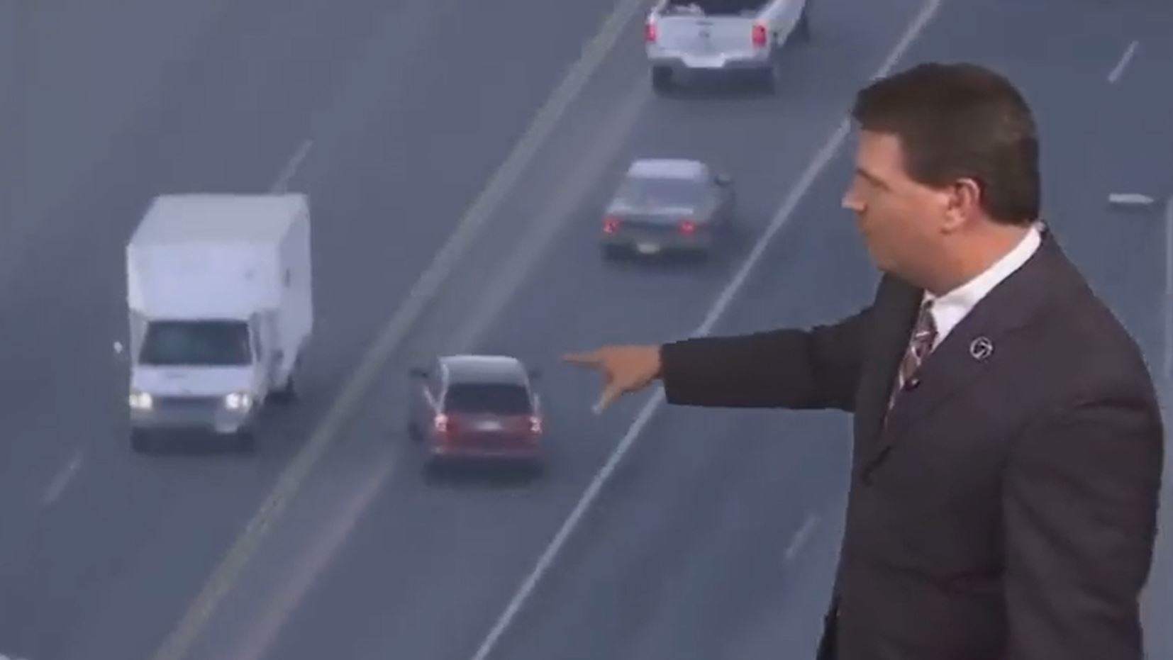 Bloke goes full GTA-mode in what surely is the wildest car-chase ever filmed