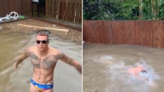 Aussie Rules star swims in floodwater and brilliantly overlays Michael Phelps commentary